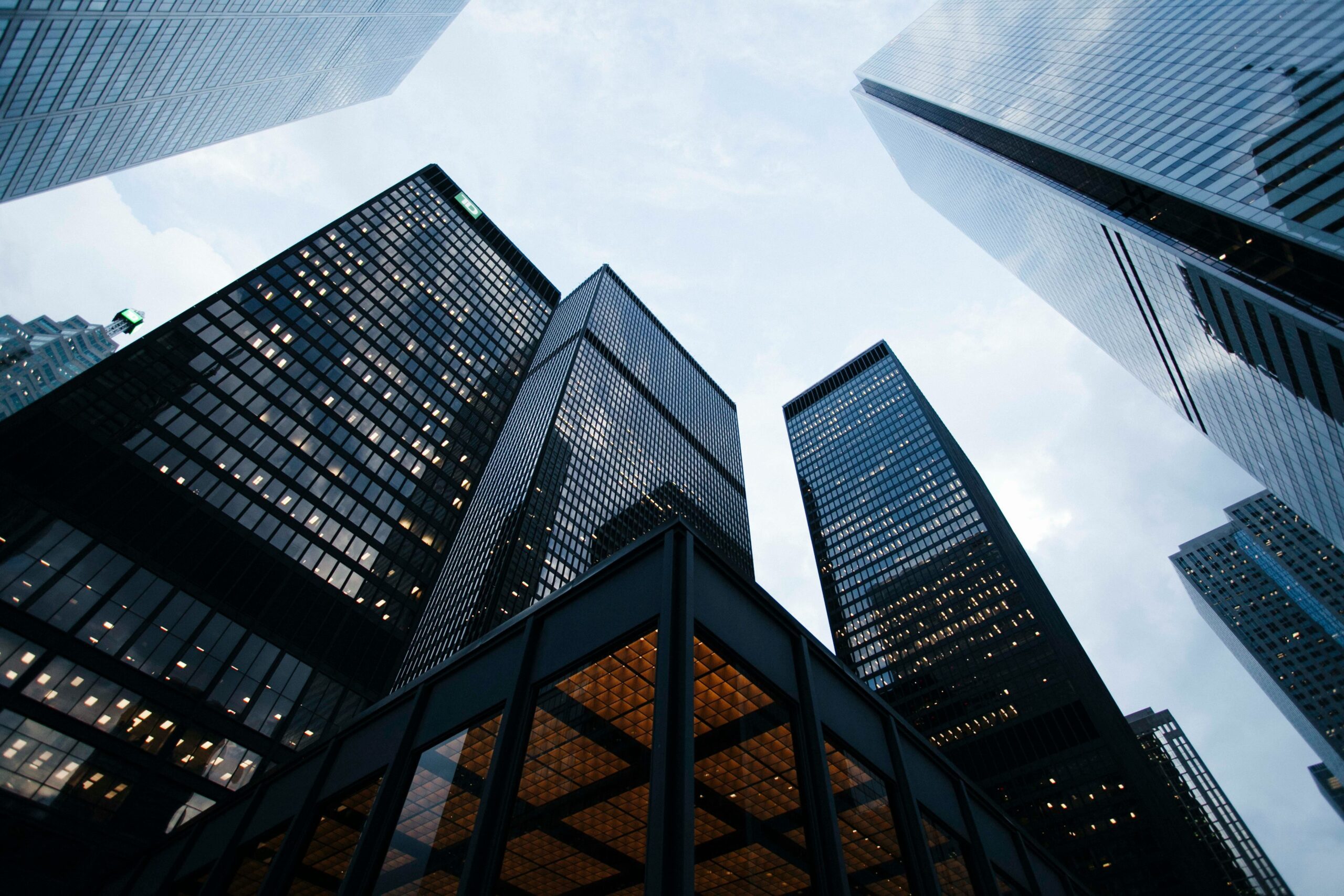 View of skyscrapers looking up. S and P Capital Merge and Acquire